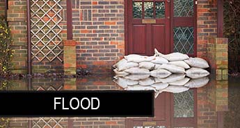Sand Bags Piled in Front of a Door
